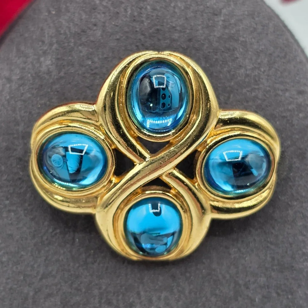 Vintage Monet Gold Tone Blue Glass Cabochon Quatrefoil Brooch Pin Abstract Retro